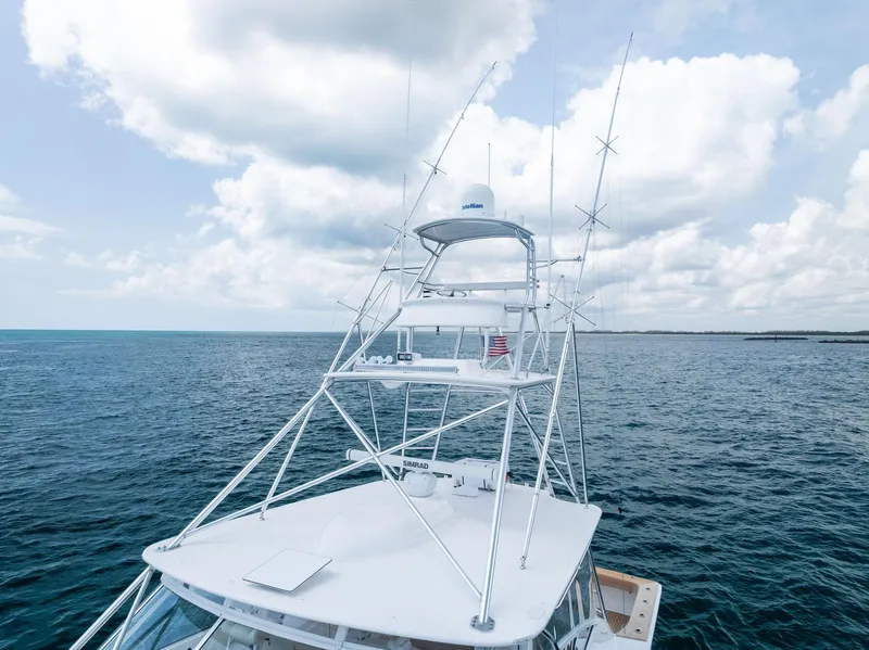 Slide: The Image of 2010 Viking 52 Open yacht on open sea under cloudy sky. - 17