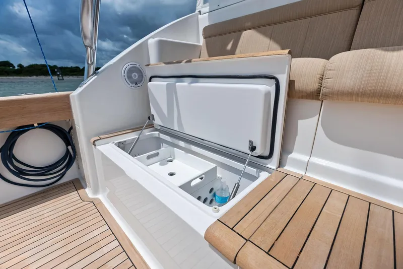 Slide: The Image of Viking 52 Open 2010 boat with open storage compartment on deck. - 24