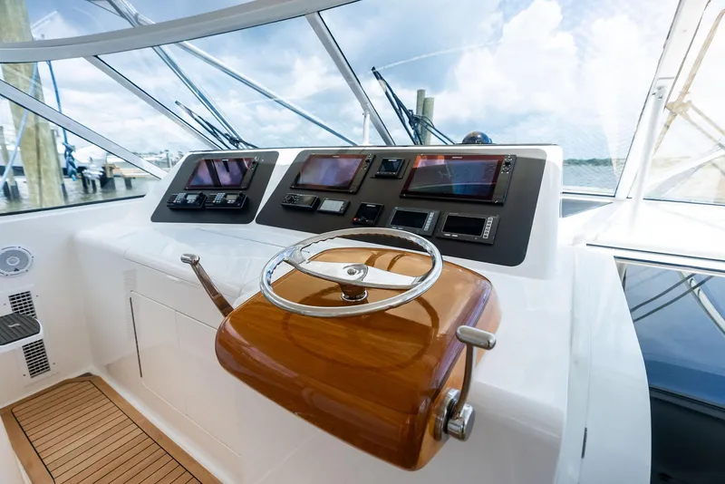 Slide: The Image of Helm of 2010 Viking 52 Open yacht with modern navigation equipment. - 28