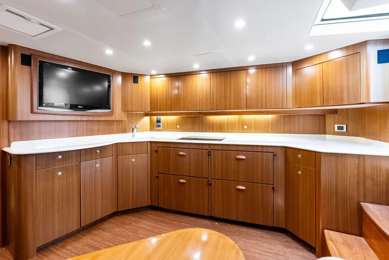 Slide: The Image of Luxurious interior of 2010 Viking 52 Open yacht with modern wood cabinetry and sleek design. - 46