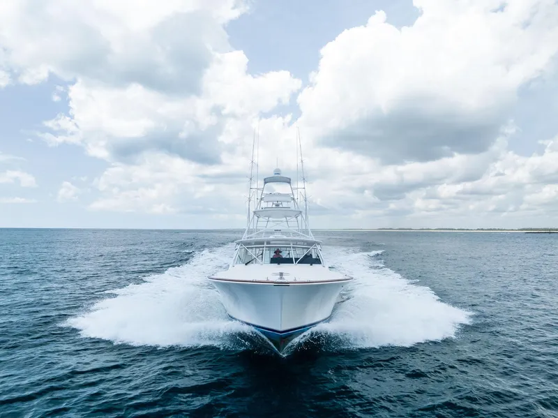 Slide: The Image of Viking 52 Open yacht cruising on open sea under cloudy sky, 2010 model. - 6