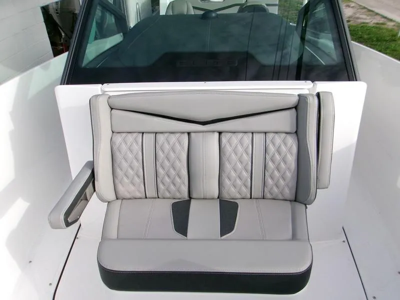 Slide: The Image of 2025 Monterey Elite 27 OB boat seat with quilted gray upholstery. - 11