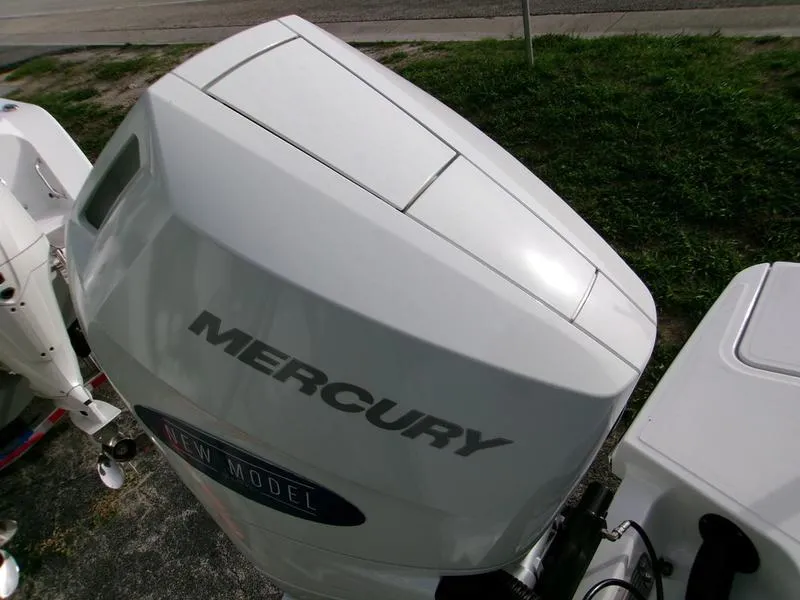 Slide: The Image of 2025 Monterey Elite 27 OB with Mercury outboard engine, viewed from above. - 15