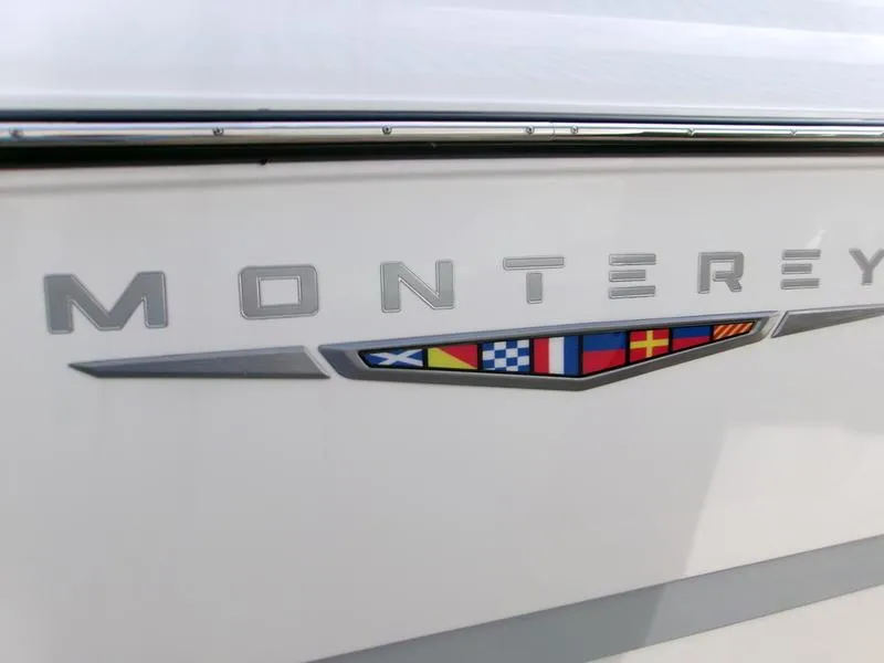Slide: The Image of 2025 Monterey Elite 27 OB logo with nautical flag design. - 18