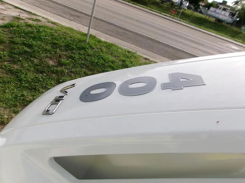 Slide: The Image of 2025 Monterey Elite 27 OB boat with "400" emblem on the side. - 2