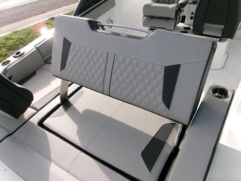 Slide: The Image of 2025 Monterey Elite 27 OB boat interior with stylish seating and modern design. - 4