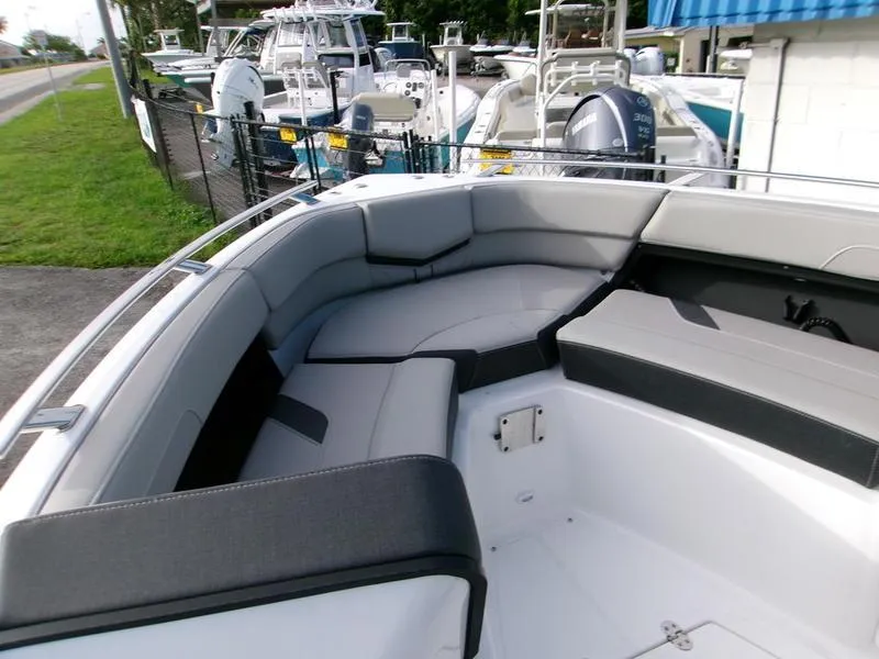 Slide: The Image of 2025 Monterey Elite 27 OB boat with spacious seating and modern design. - 8