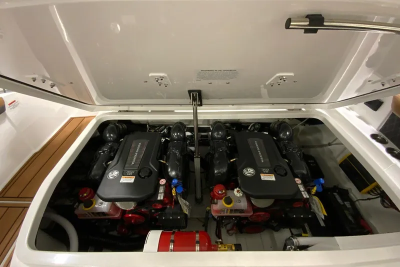 Slide: The Image of Engine compartment of 2026 Cobalt R31 boat, showcasing dual powerful engines. - 36
