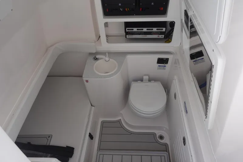 Slide: The Image of 2025 Sea Fox 328 Commander boat interior with toilet and sink. - 30