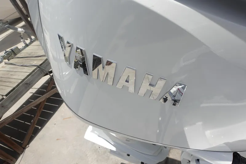 Slide: The Image of Yamaha engine on 2025 Sea Fox 328 Commander boat, close-up view. - 34