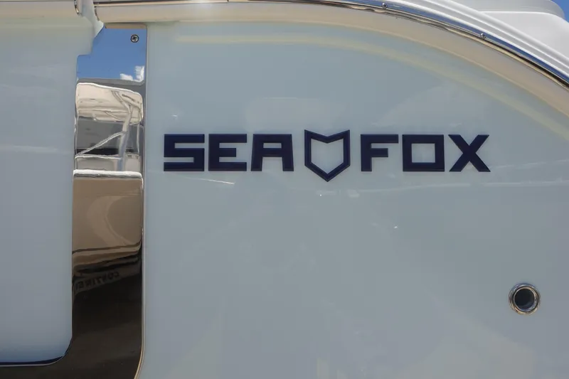 Slide: The Image of Sea Fox 328 Commander 2025 logo on boat exterior. - 36