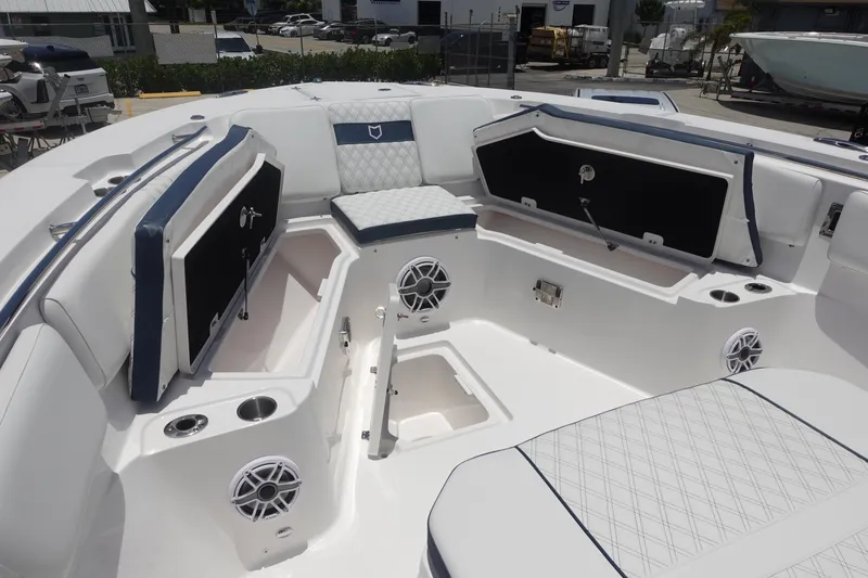 Slide: The Image of 2025 Sea Fox 328 Commander boat interior with seating, storage, and speakers. - 4