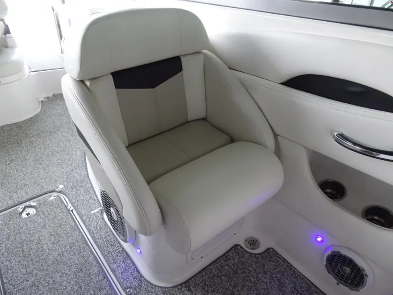 Slide: The Image of 2014 Chaparral 287 SSX boat interior with plush seating and modern design. - 19