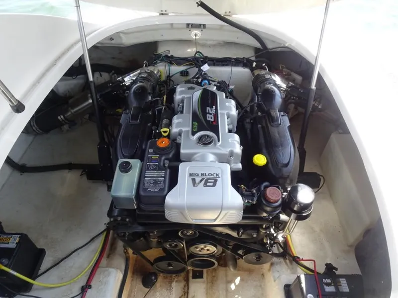 Slide: The Image of 2014 Chaparral 287 SSX engine compartment with Big Block V8 engine. - 26