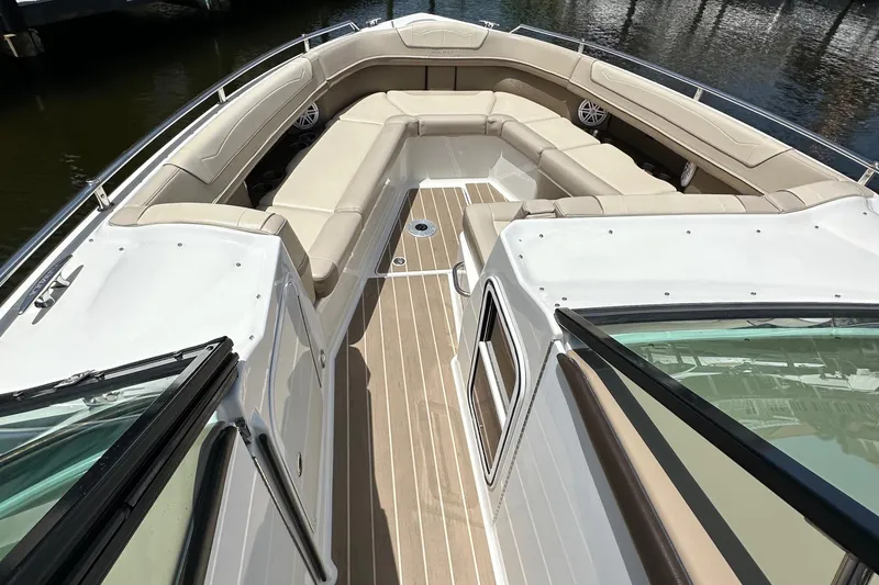 Slide: The Image of 2019 Formula 350 Crossover Bowrider with spacious seating and sleek design. - 11