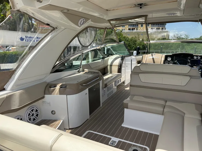 Slide: The Image of 2019 Formula 350 Crossover Bowrider interior with luxurious seating and modern amenities. - 16