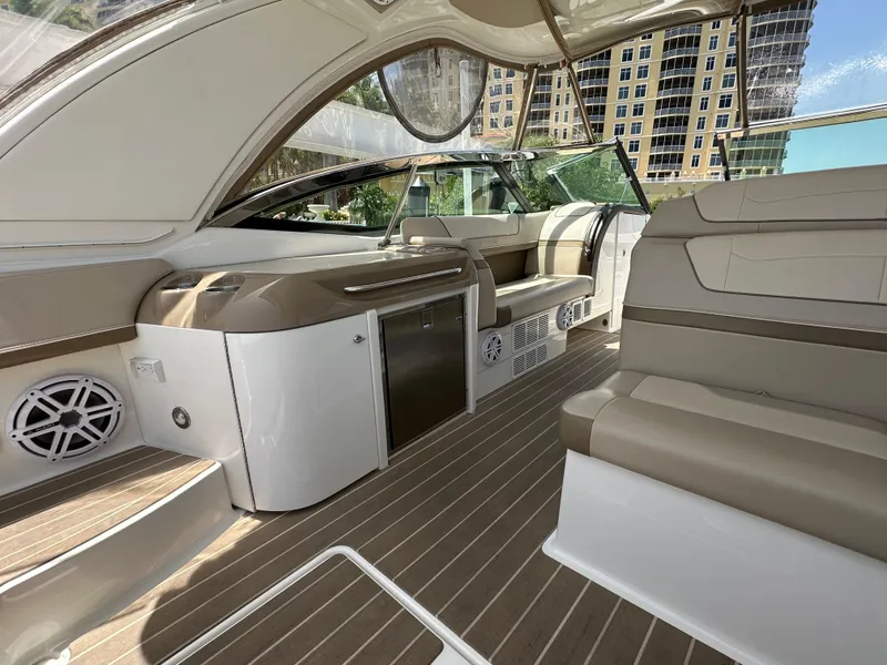 Slide: The Image of 2019 Formula 350 Crossover Bowrider interior with luxurious seating and modern amenities. - 19