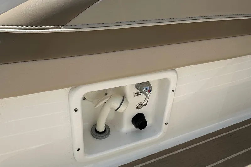 Slide: The Image of 2019 Formula 350 Crossover Bowrider water hookup and outlet detail. - 22