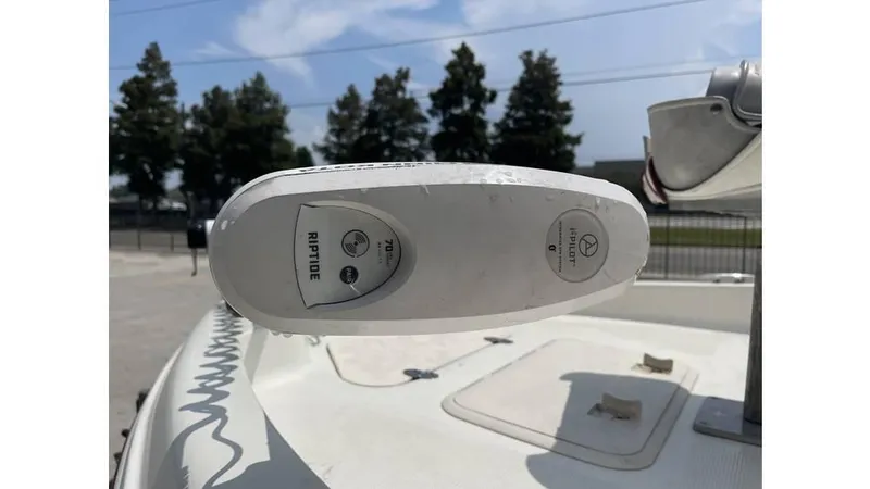 Slide: The Image of Bay Stealth 1880 boat, 2002 model, featuring a Riptide trolling motor. - 10