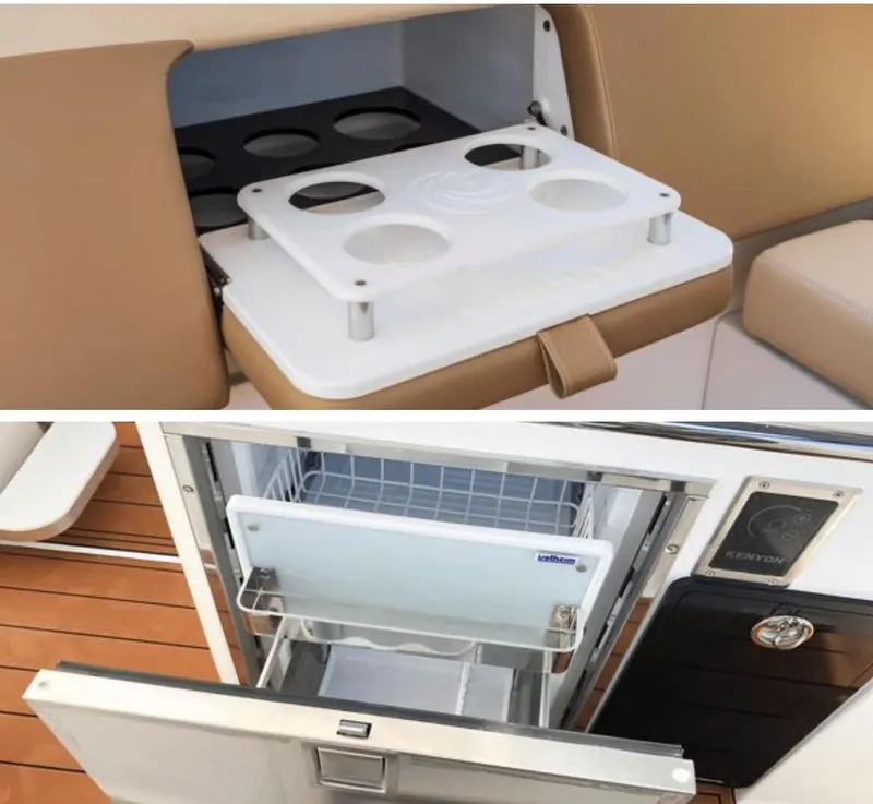 Slide: The Image of Aquila 32 Sport 2022 boat interior with cup holder and storage compartments. - 10