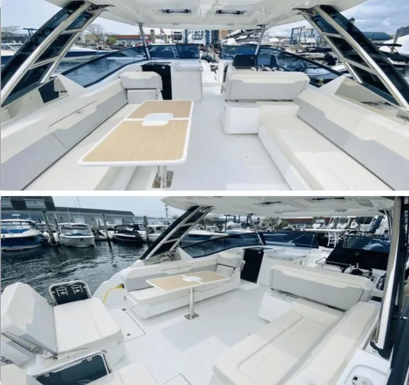 Slide: The Image of 2022 Aquila 32 Sport yacht interior with spacious seating and elegant design at a marina. - 4