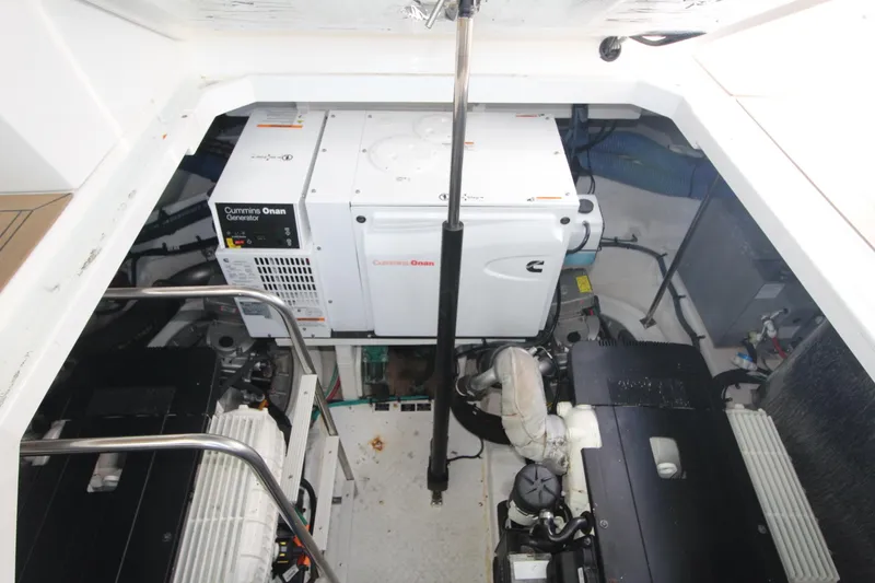 Slide: The Image of Engine room of 2013 Cruisers Yachts 430 SC with Cummins Onan generator. - 21