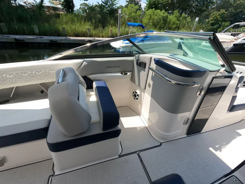 Slide: The Image of 2026 Regal LX6 boat interior with luxurious seating and modern design. - 15