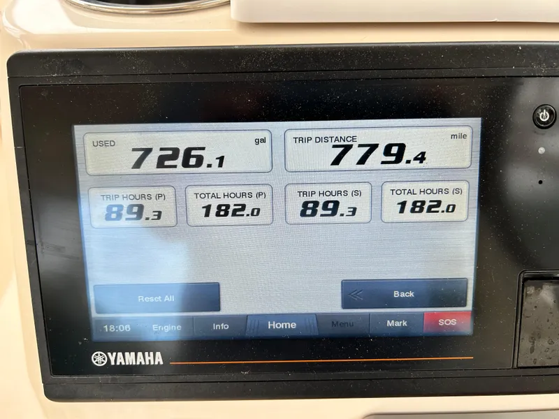 Slide: The Image of Yamaha display showing fuel usage and trip data on a 2018 Grady-White Freedom 325 boat. - 17