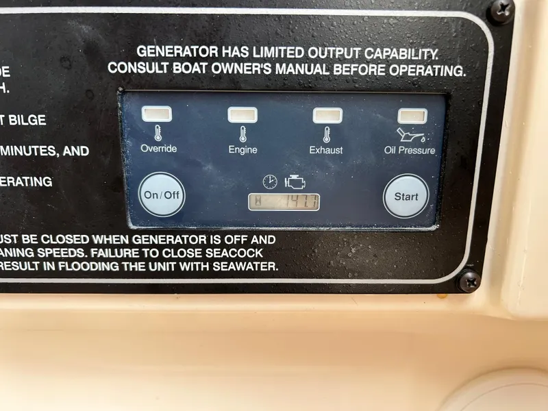 Slide: The Image of Control panel of a 2018 Grady-White Freedom 325 boat generator. - 21