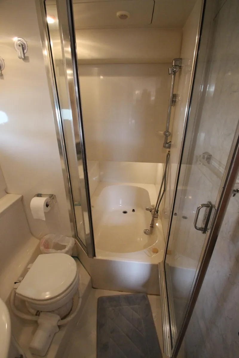 Slide: The Image of Bathroom in 1996 Bayliner 3988 Command Bridge Motoryacht with shower and toilet. - 27