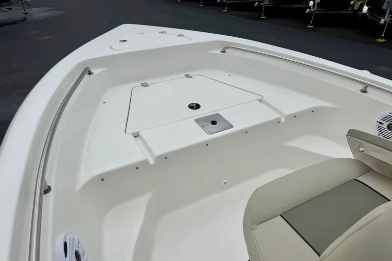 Slide: The Image of 2025 Key West 189 FS boat interior with seating and storage compartments. - 10