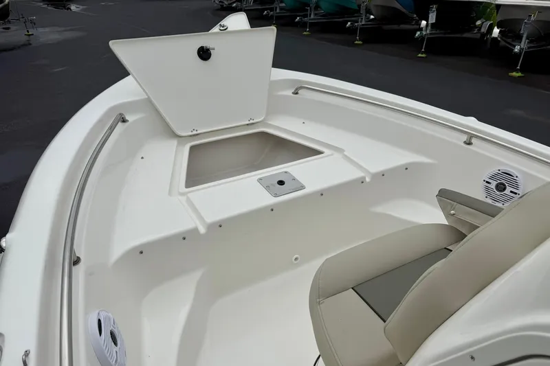 Slide: The Image of 2025 Key West 189 FS boat interior with open storage compartment and seating. - 11