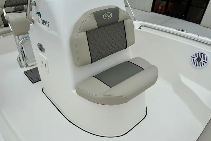 Slide: The Image of 2025 Key West 189 FS boat seat with gray and beige upholstery. - 12