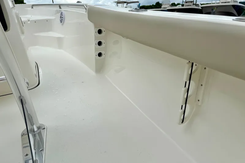 Slide: The Image of 2025 Key West 189 FS boat interior, featuring sleek white design and modern fittings. - 18