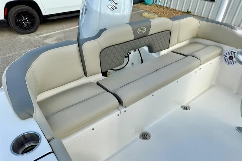 Slide: The Image of 2025 Key West 189 FS boat interior with cushioned seating and modern design. - 20