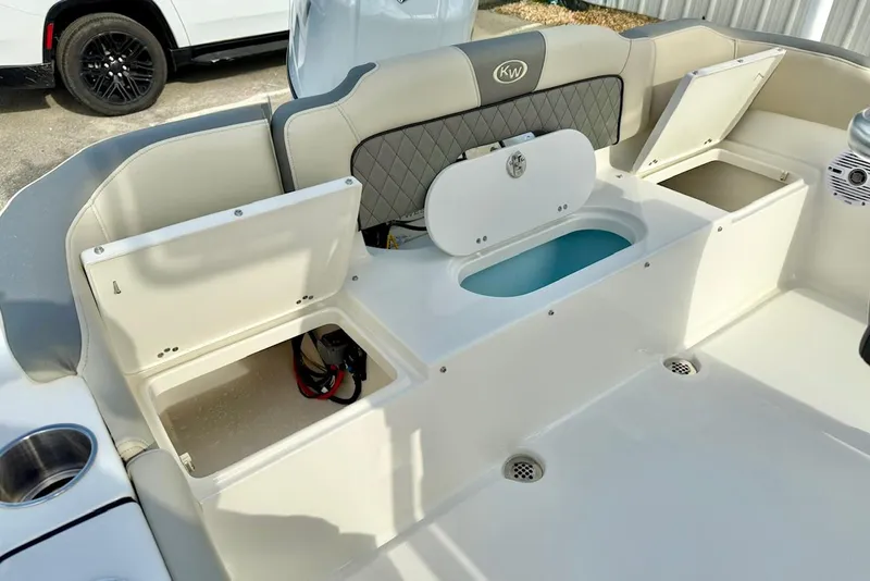 Slide: The Image of 2025 Key West 189 FS boat interior with storage compartments and seating. - 21