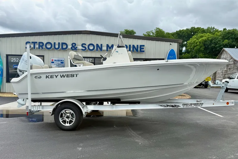 Slide: The Image of 2025 Key West 189 FS boat on trailer at Stroud & Son Marine dealership. - 6