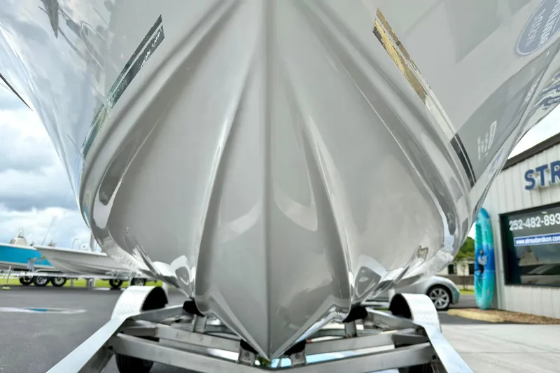 Slide: The Image of 2025 Key West 189 FS boat hull on trailer, showcasing sleek design and craftsmanship. - 8