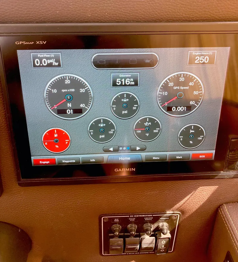 Slide: The Image of Garmin GPS display on 2018 Ranger Tugs R-29 S showing navigation and engine data. - 13