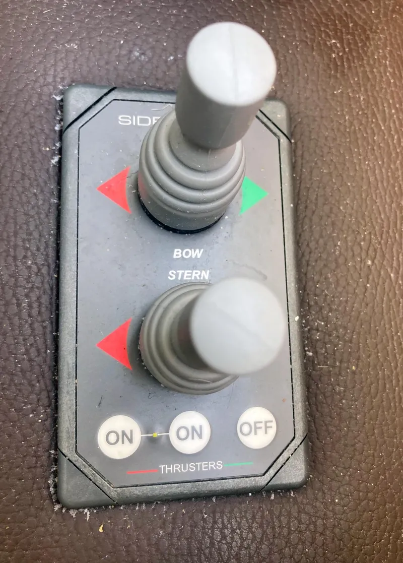Slide: The Image of Control panel for bow and stern thrusters on 2018 Ranger Tugs R-29 S boat. - 16