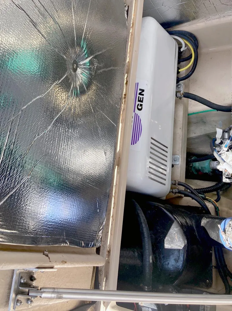 Slide: The Image of Engine compartment of 2018 Ranger Tugs R-29 S with generator and insulation. - 20