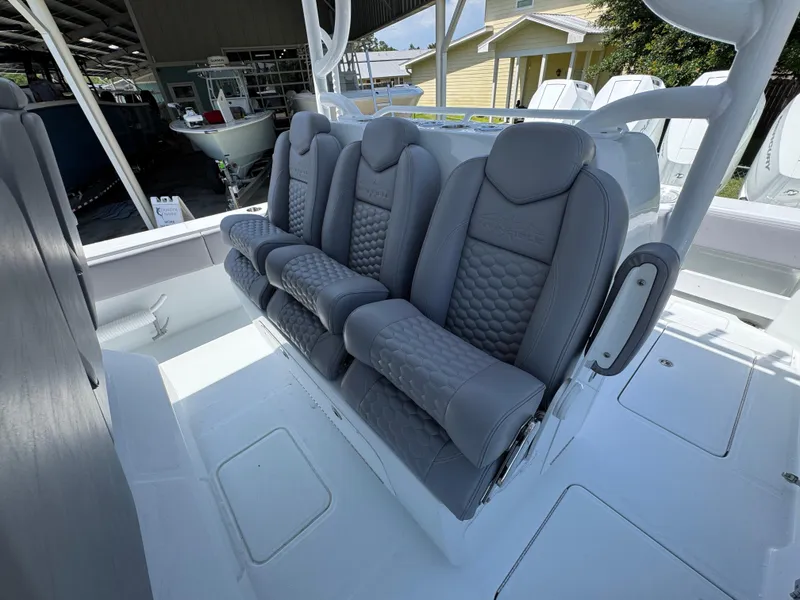 Slide: The Image of 2026 Invincible 43 Open Fisherman boat with luxurious gray seating. - 22