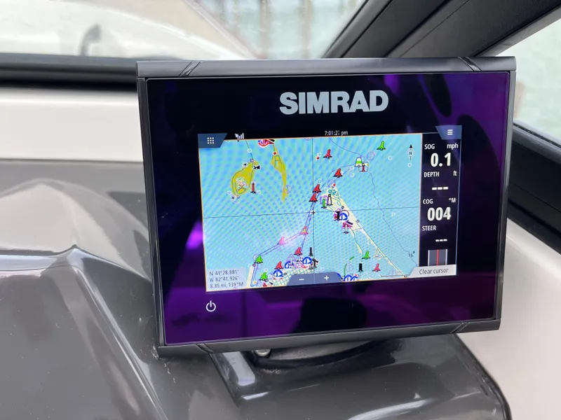 Slide: The Image of Simrad navigation display on 2015 Sea Ray 19 SPX boat dashboard. - 16