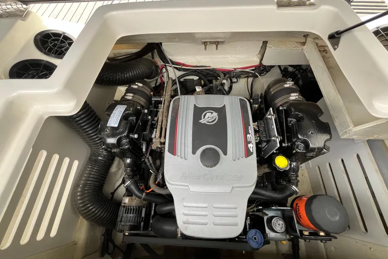 Slide: The Image of 2015 Sea Ray 19 SPX engine compartment with MerCruiser 4.3L engine. - 18