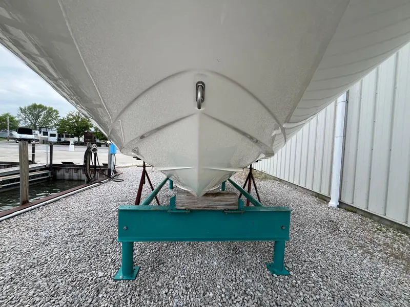 Slide: The Image of 2015 Sea Ray 19 SPX boat on a trailer, viewed from below. - 21