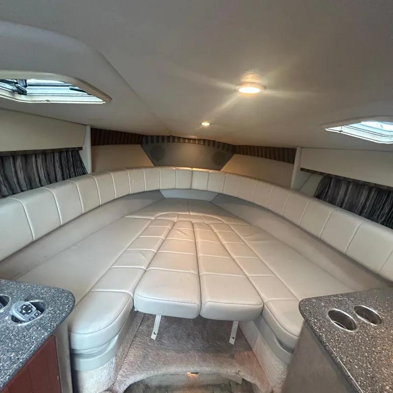 Slide: The Image of Interior of 2005 Formula 330 SS boat with spacious seating and modern design. - 20