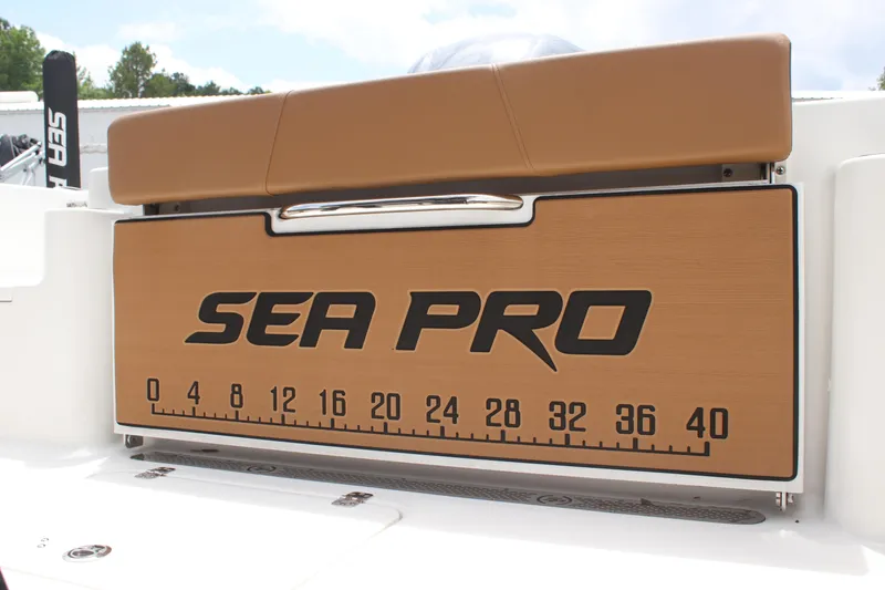 Slide: The Image of 2024 Sea Pro 242 Center Console boat with branded measuring board. - 20