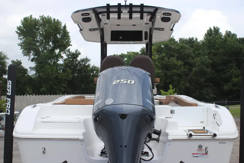 Slide: The Image of 2024 Sea Pro 242 Center Console boat with powerful 250 engine, rear view. - 5
