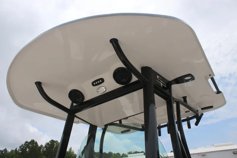 Slide: The Image of 2024 Sea Pro 242 Center Console T-top with speakers and lights, viewed from below. - 9