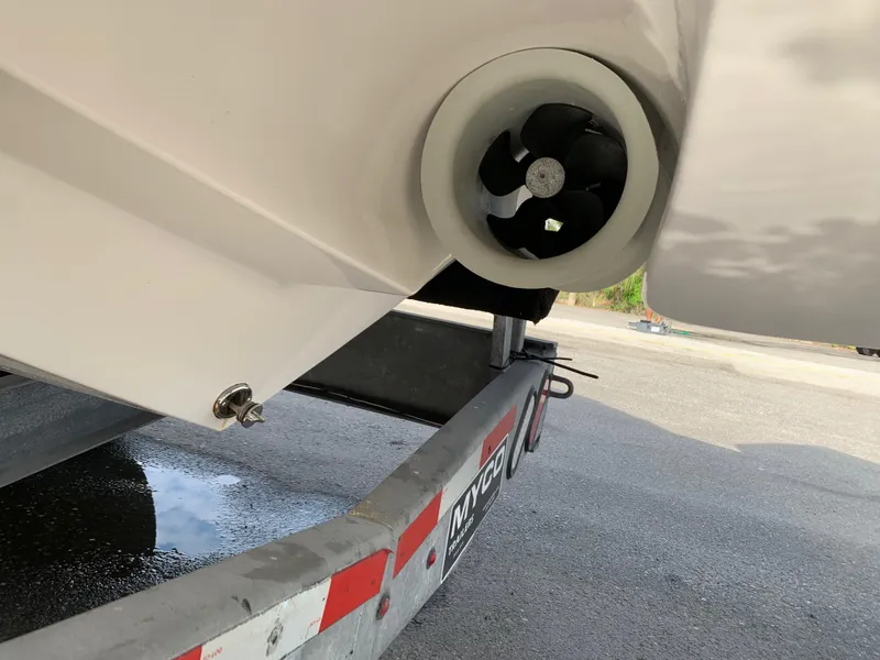 Slide: The Image of 2023 Mystic Powerboats M3800 on trailer, showcasing propeller detail. - 16